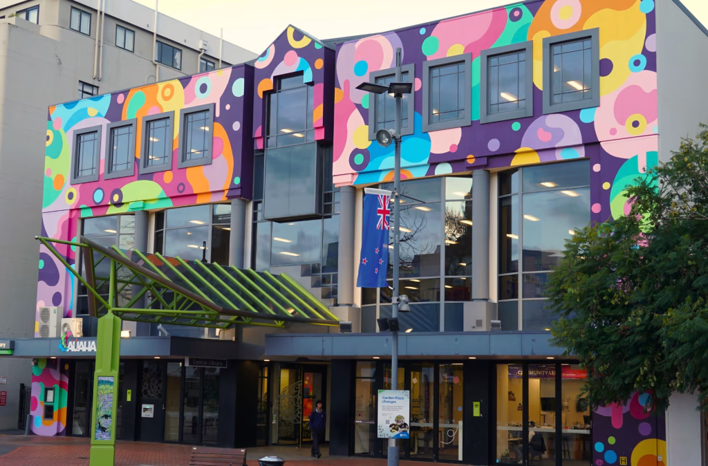 Sarah Thomson - for Mayor of Hamilton City The library in Hamilton, New Zealand. It is brightly coloured with a mural painted on the front. This mural is coloured circles.